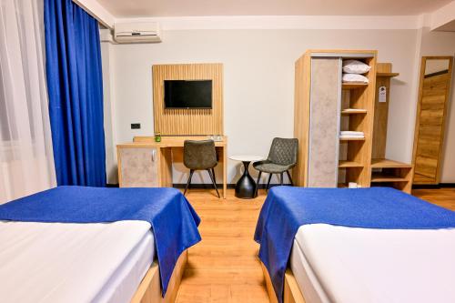 Hotel Class Hermannstadtにあるテレビまたはエンターテインメントセンター