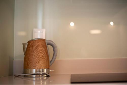 a candle sitting on top of a counter at Palm Tree Beach Villa in Kakongiónion