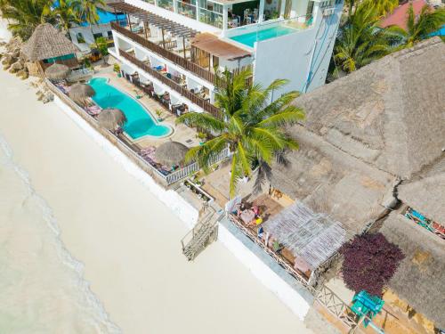 an aerial view of a resort on the beach at ZAN Beach House in Bwejuu