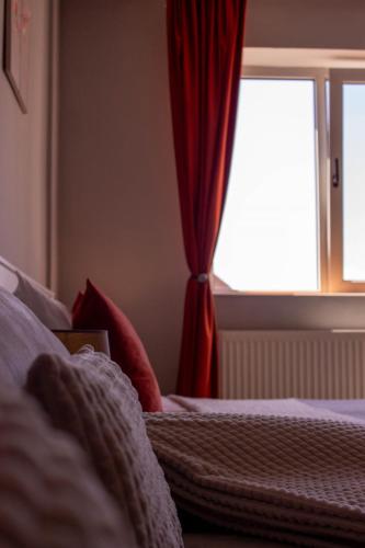 Postel nebo postele na pokoji v ubytování Lyra Apartment
