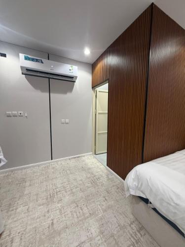 Postel nebo postele na pokoji v ubytování غرفة ستوديو فندقية