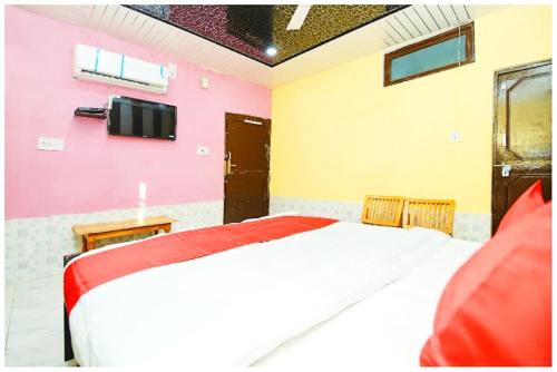 Postel nebo postele na pokoji v ubytování Hotel Kiran Talai HP