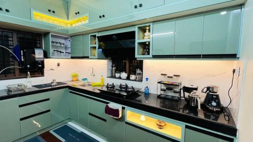 Kuchyň nebo kuchyňský kout v ubytování Green Villa