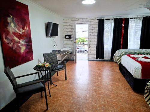 Katil atau katil-katil dalam bilik di The Queenslander Motel