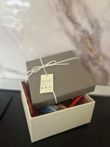 a box full of books with a tag on it at Stella 3 Apartment in Negotino