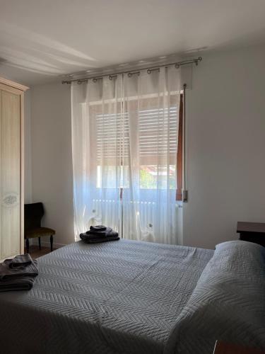 Ένα ή περισσότερα κρεβάτια σε δωμάτιο στο Casa Nello