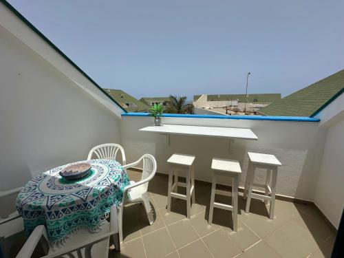 Un balcón o terraza de Leme Bedje - By Bobbywashere