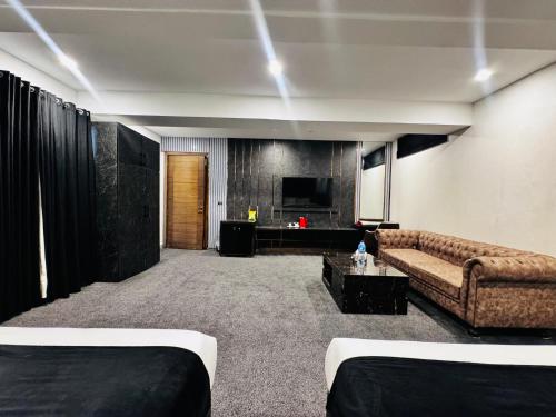 Гостиная зона в OXVUE Boutique Hotel