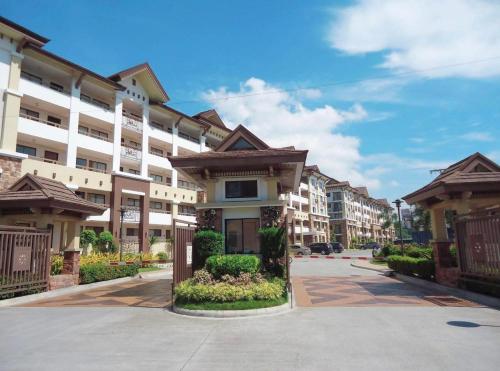 a row of apartment buildings on a street at 2 Bedroom Condo Davao - Nest and Nook in Davao City