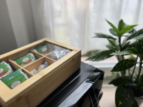 a wooden box sitting on top of a table at Apartament Piaskowa Mountain & Coffee in Wałbrzych