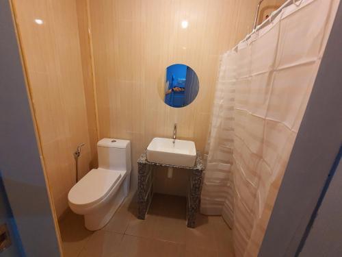 Ένα μπάνιο στο Denzel's Cosy Inn