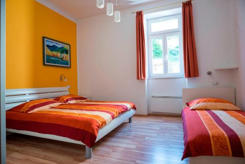 Postel nebo postele na pokoji v ubytování Apartma Most