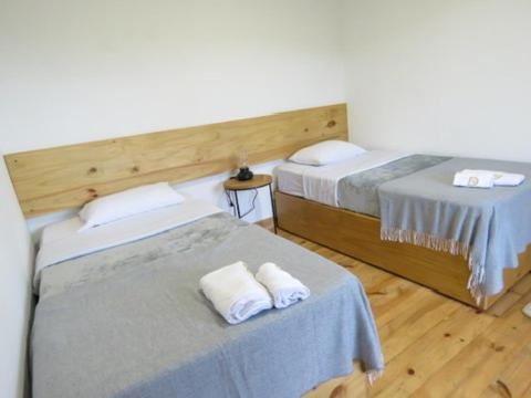Una cama o camas en una habitación de Casa de Lujo para una Estancia Inolvidable
