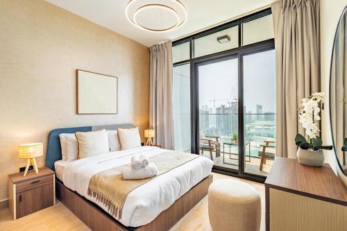 Katil atau katil-katil dalam bilik di Full Cleveland & Canal View - Big Balcony - High Floor - 5 min walk from Cleveland, ADGM and Galleria