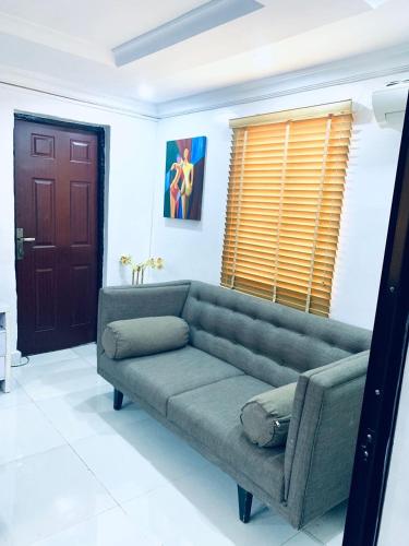 Zona de estar de Cozy & Comfy Unit in the Heart of Victoria Island