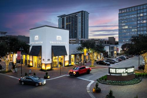 a city with cars parked in a parking lot at Staybridge Suites Plano - Legacy West Area by IHG in Frisco