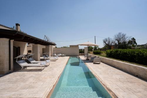 Πισίνα στο ή κοντά στο Felice Fontana luxury holiday retreat in Puglia