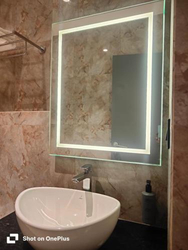 Un baño de The Citi Residenci Hotel, Bidhannagar