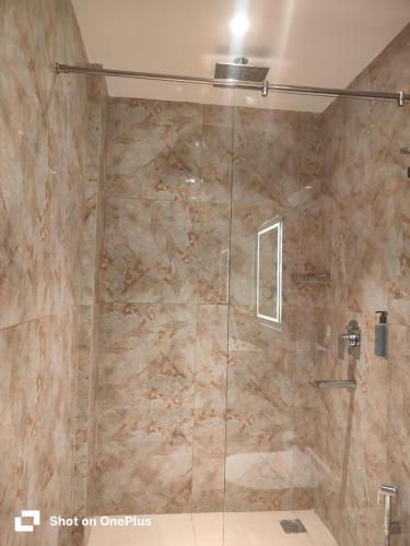 Un baño de The Citi Residenci Hotel, Bidhannagar