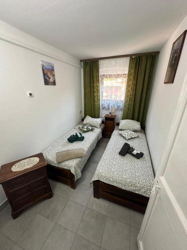 Ένα ή περισσότερα κρεβάτια σε δωμάτιο στο Casa Tre Fiori 2