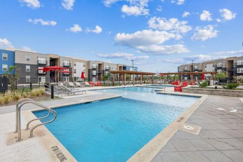 an image of a swimming pool at a apartment complex at Luxury Home W Pool & Gym Mins To Baylor Hospital in Marble Falls