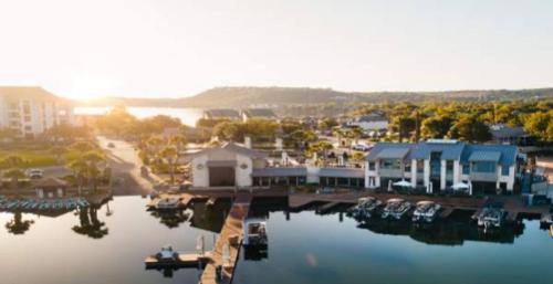 an aerial view of a marina with boats in the water at Luxury Home W Pool & Gym Mins To Baylor Hospital in Marble Falls