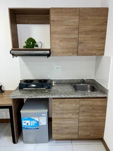 Η κουζίνα ή μικρή κουζίνα στο Edificio Plaza U Wellness