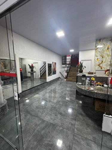 Kuchyň nebo kuchyňský kout v ubytování Pluma Hotel Cidade