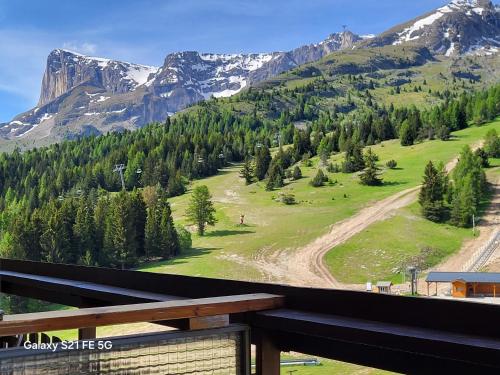 a view from the balcony of a mountain at Logement parents CAMP BASKET SUPERDEVOLUY in Le Dévoluy