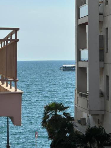 a view of the ocean from a building at Aristoteluos By the Sea in Thessaloniki