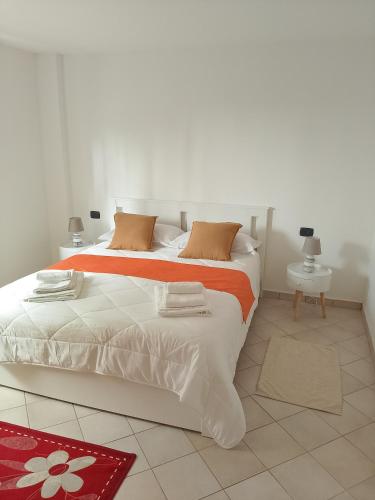 Ένα ή περισσότερα κρεβάτια σε δωμάτιο στο ComfortHouse - Vicino al centro