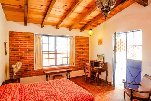 Casa Aurora Garden Retreatにあるベッド