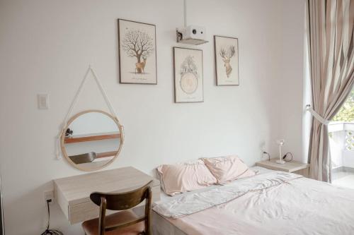 Postel nebo postele na pokoji v ubytování Lamoon Villa Huế