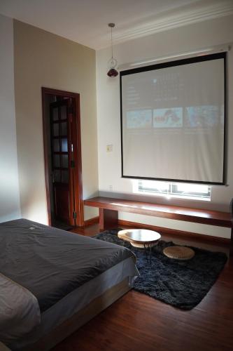 Postel nebo postele na pokoji v ubytování Lamoon Villa Huế