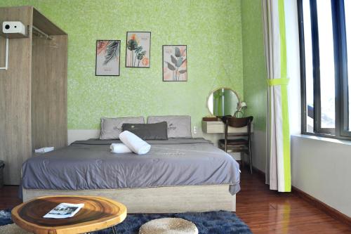 Postel nebo postele na pokoji v ubytování Lamoon Villa Huế