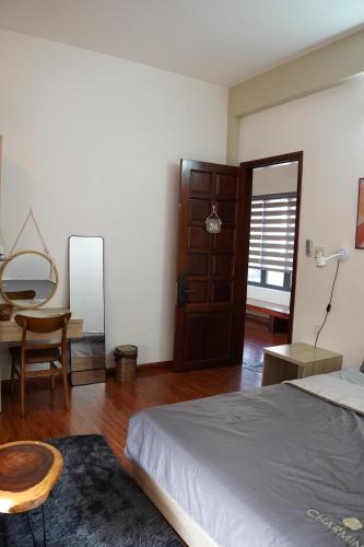 Postel nebo postele na pokoji v ubytování Lamoon Villa Huế