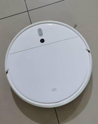 a white object is sitting on a tiled floor at Cozy Suite for 2-6 pax near Kek Lok Si, Penang Hill, Sunshine Central in Ayer Itam