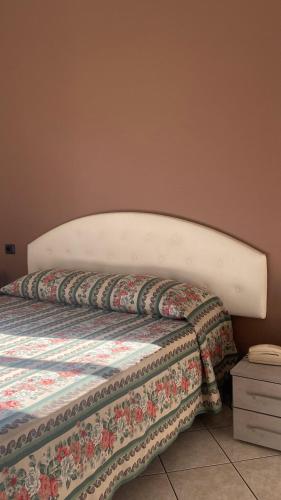 Una cama o camas en una habitación de Hotel Rainero
