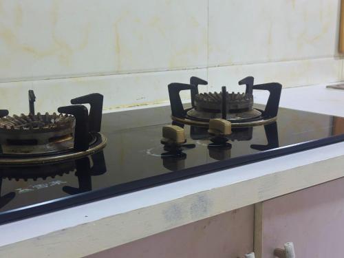 two burners sitting on top of a counter at Bahaaru Villa Surf and Stay in Himmafushi