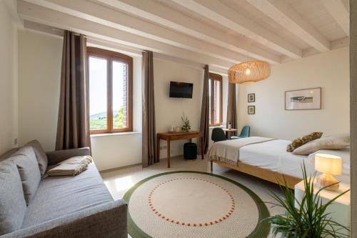 Postel nebo postele na pokoji v ubytování Agriturismo Corte Vaona