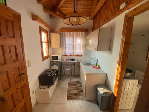 Kuchyň nebo kuchyňský kout v ubytování Stavros Classic Appartment