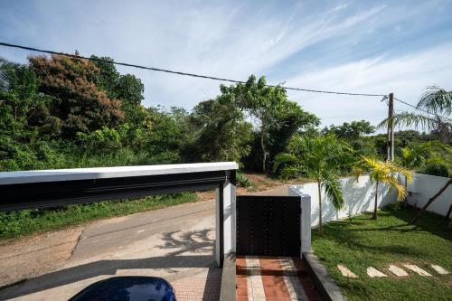 a view from the driveway of a house at Tangalle Villa in Tangalle