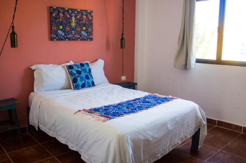 Ένα ή περισσότερα κρεβάτια σε δωμάτιο στο Kay Apartments Isla Mujeres