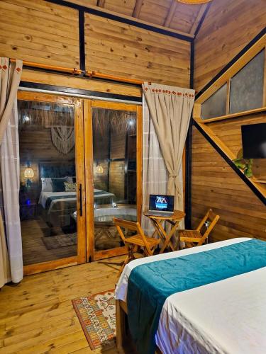 Postel nebo postele na pokoji v ubytování Suite Premium con jacuzzi y playa cerca al Tayrona