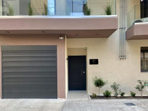 a garage door in front of a house at ATHENIAN Vibes in Athens