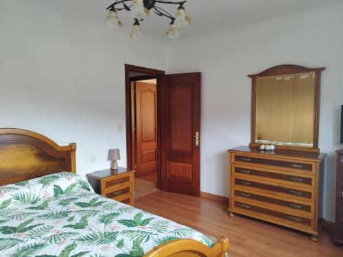 Ένα ή περισσότερα κρεβάτια σε δωμάτιο στο Casa A Peneda