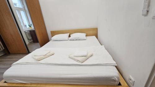 Кровать или кровати в номере Relax Apartment