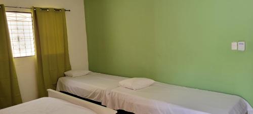 Postel nebo postele na pokoji v ubytování Villa Colonial Room 4