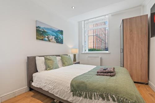 Ένα ή περισσότερα κρεβάτια σε δωμάτιο στο Leeds Central Hub - Free Parking - Sleeps 5