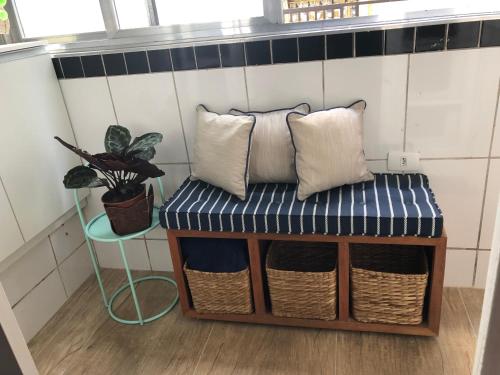 Ένα ή περισσότερα κρεβάτια σε δωμάτιο στο Apart Ponta da Praia - Santos